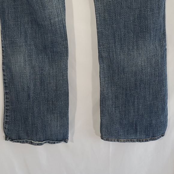 Michael Kors light wash jeans with gold studs - Picture 9 of 10